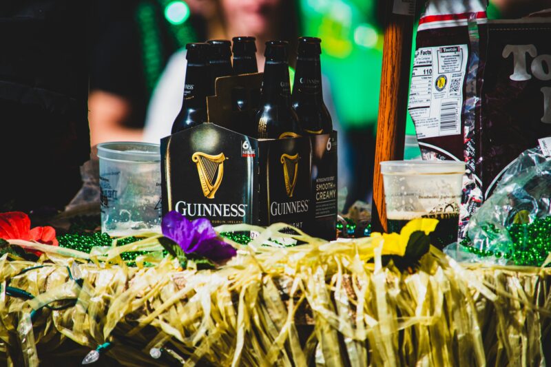St Patricks day table, featuring a pack of guinness and gold tinsel